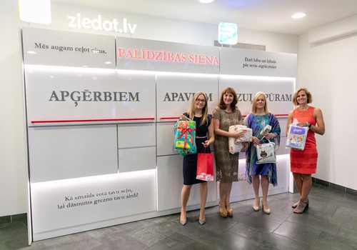 Ziedo Māmiņu Klubam - t/c Spices jaunajā interaktīvajā ziedošanas sienā!